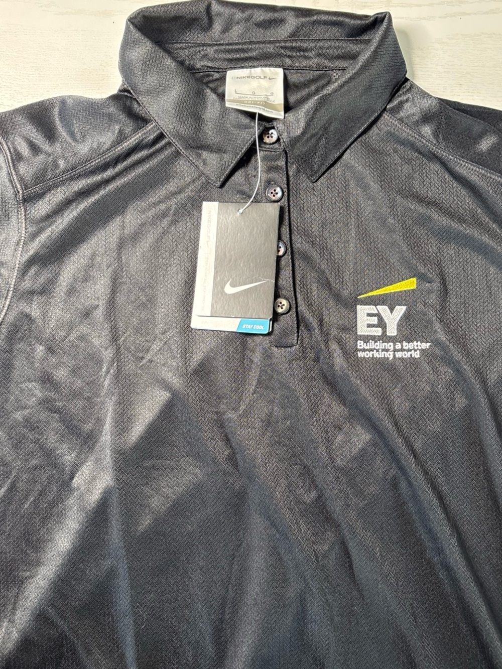 Nike women's Black Polo with Embroidered Logo and Yellow Accent